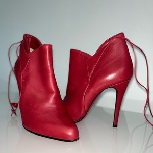 Slightly used size 37, Christian Louboutin red boots